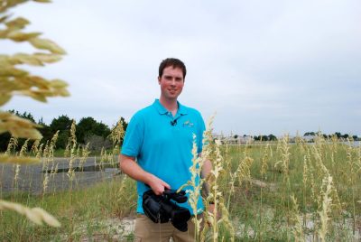 Clark uses the “Clark Cam” to film salt marsh species in North Carolina.