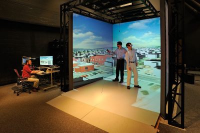 Researchers in a 3-D model of downtown Blacksburg in Virginia Tech’s VisCube