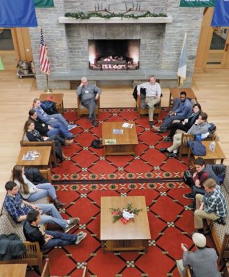 The weeklong trip is a test of endurance as the group navigates multiple stops in 12-plus-hour days. Here, the group holds a debriefing session at the National Conservation Training Center in Shepherdstown, West Virginia.