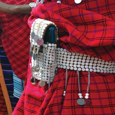 The cellphone has gained a place on many Maasai belts, next to the sword.